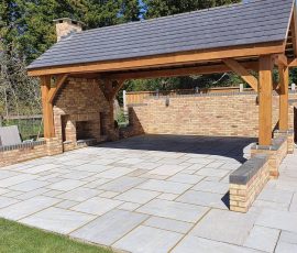 Spacious outdoor patio with fireplace