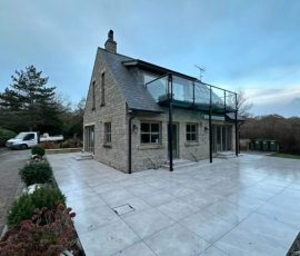 Modern stone house with balcony