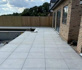 Newly laid patio tiles outside house